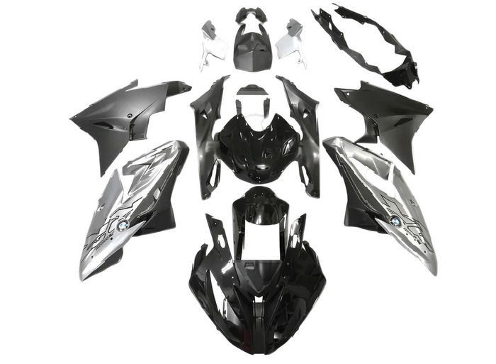 A set of motorcycle fairing body panels in glossy black and silver, arranged symmetrically on a white background.