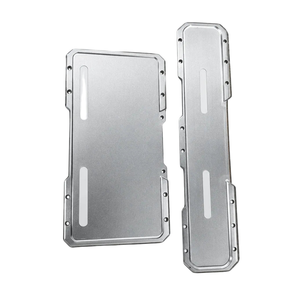 Two brushed aluminum metal plate components with pre-drilled screw holes and cutouts, displayed on a light gray background.