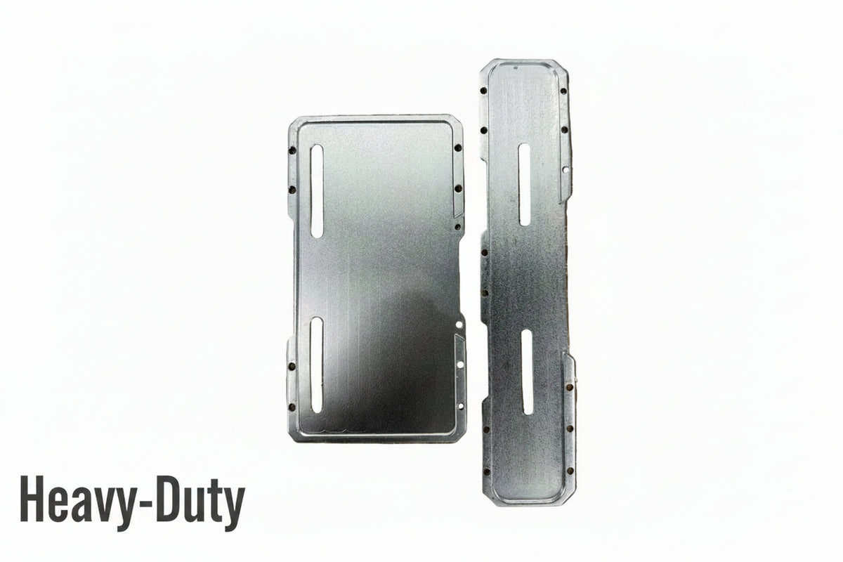 Two brushed metal mounting plates with pre-drilled screw holes and cutouts, displayed on a brown textured bubble wrap background.
