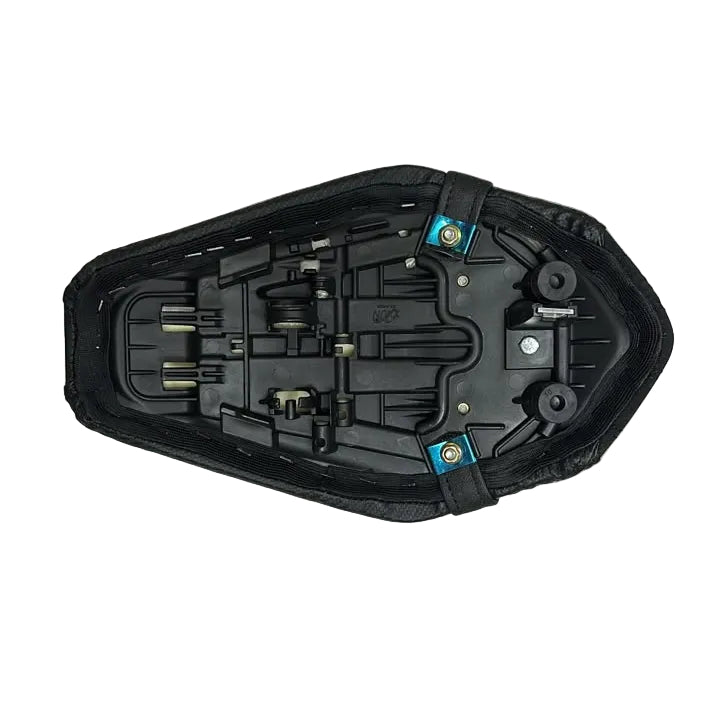 A black plastic motorcycle or scooter seat cushion shown from the underside, resting on a white plastic sheet.