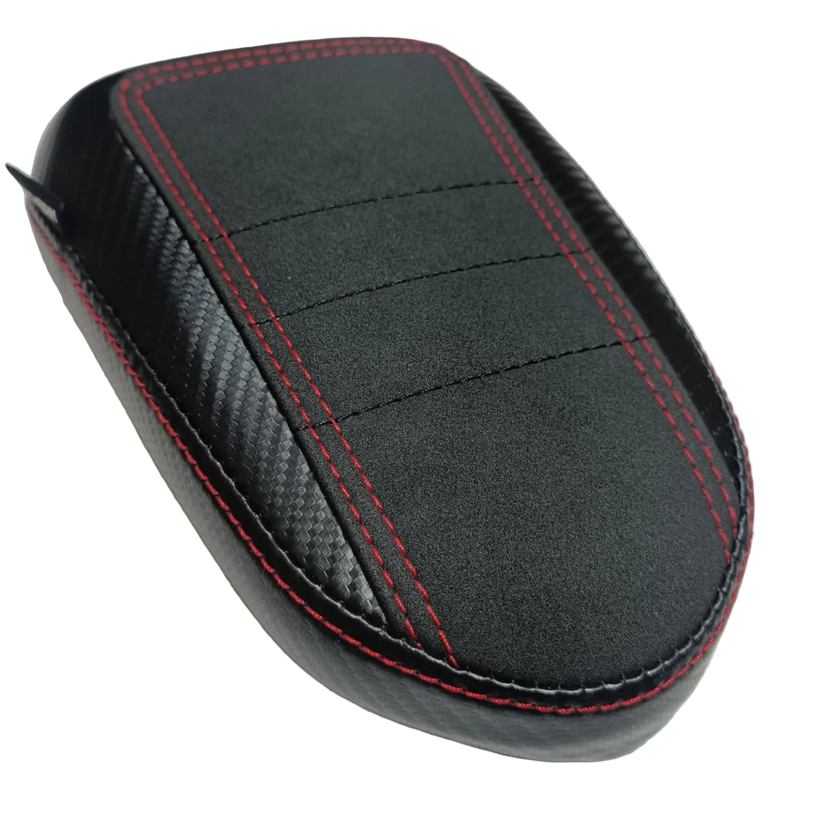 A black motorcycle or scooter seat cover with a carbon fiber pattern side panel and red contrast stitching, shown on a light textured surface.